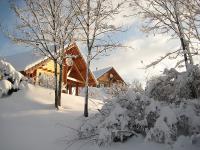 Chalets sous la neige Jura